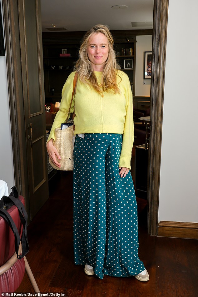The blonde beauty completed her look with a raffia tote bag and chunky trainers