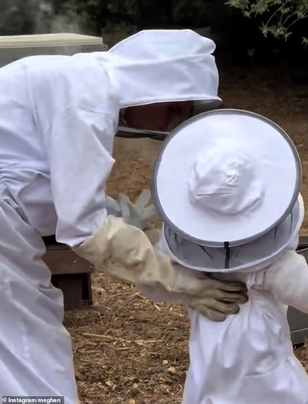 The pair wore matching outfits in a vast field, but Lilibet accessorised with a pair of adorable rainbow wellies