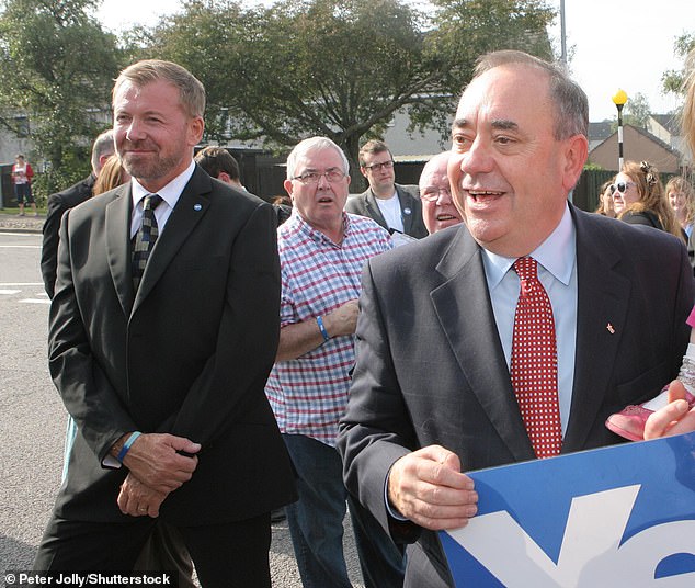 The father-of-six, was also one of Alex Salmond's bodyguards during the late former First Minister's period in office in 2014 (the two pictured in September that year)