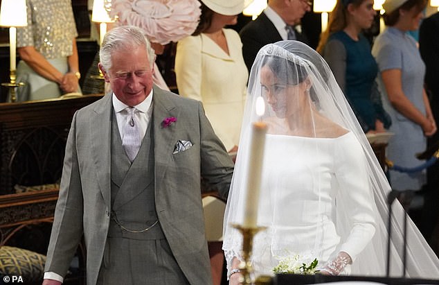 Prince Charles walking Meghan down the aisle