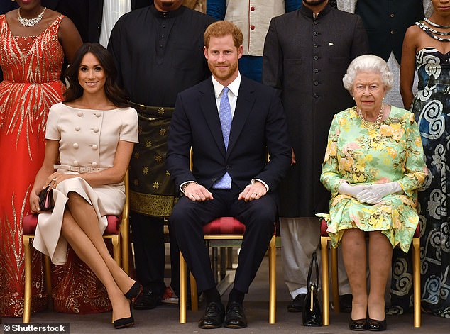 Harry and Meghan with the Queen at an event in June 2018. Lady Elizabeth said: 'Turning one's back on duty is completely alien to the Queen and she has been left very hurt by it all'