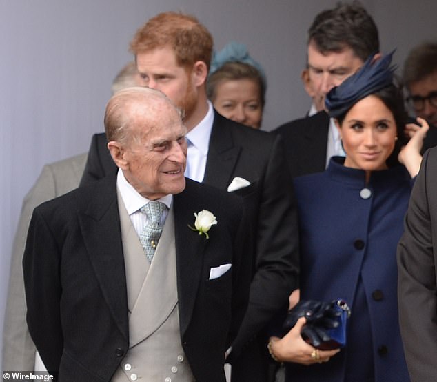 Philip and Meghan at Princess Eugenie wedding in October 2018