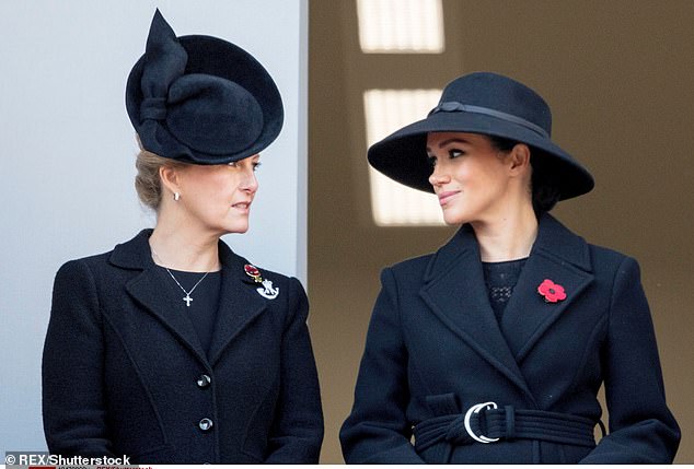 Meghan and Sophie look at each other at the Remembrance Day Service in 2019