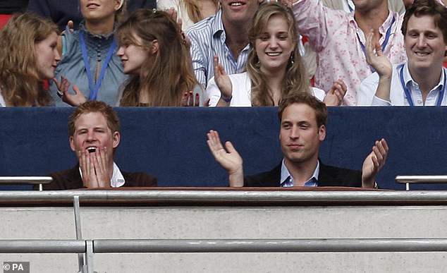 Harry and William are pictured enjoying the concert which they organised together