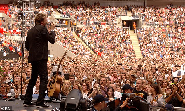 Duran Duran's Simon Le Bon is pictured onstage during the star-studded pop concert in memory of Diana