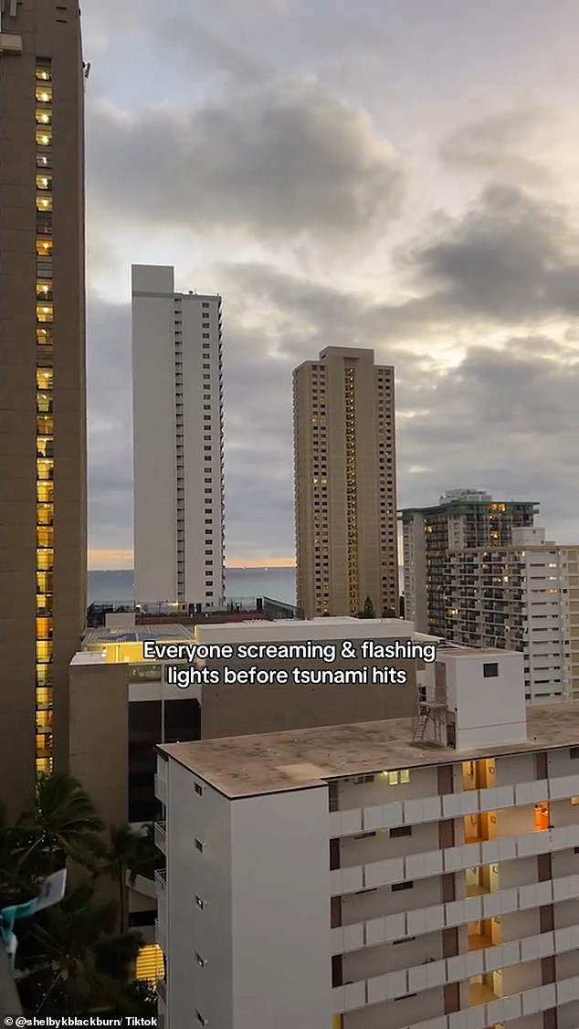 In a follow-up clip, Shelbykblackburn films herself with huge skyscrapers in the background with cheers heard in the background