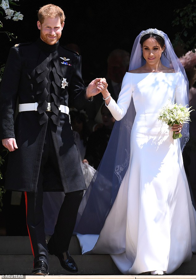 Meghan and Harry pictured outside St George's Chapel in Windsor Castle on their wedding day in 2018