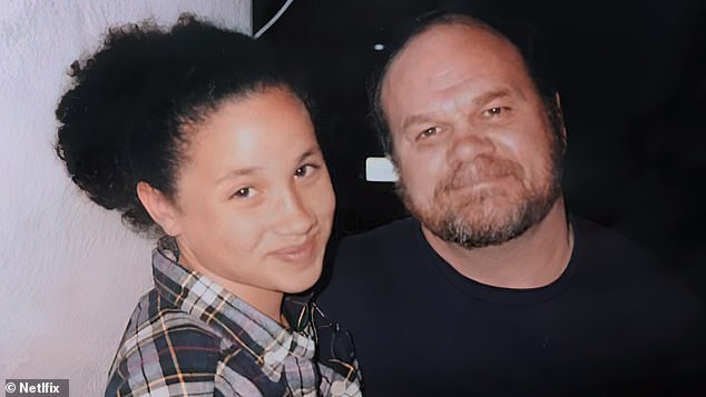A young Meghan with her father