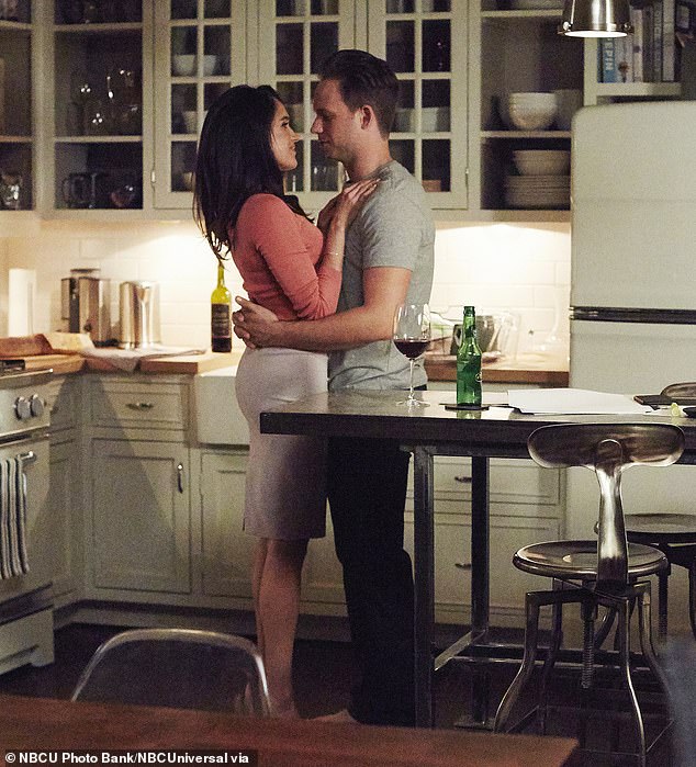 They continued: 'Mike was not in the bed next to her but sitting aside the bed. I'd say that's when I noticed for sure but I'm slow on the uptake!'. Pictured: Meghan with Patrick as Mike in series five of Suits in 2015