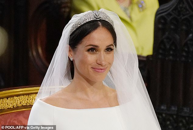 Meghan eventually opted to wear Queen Mary's Diamond Bandeau