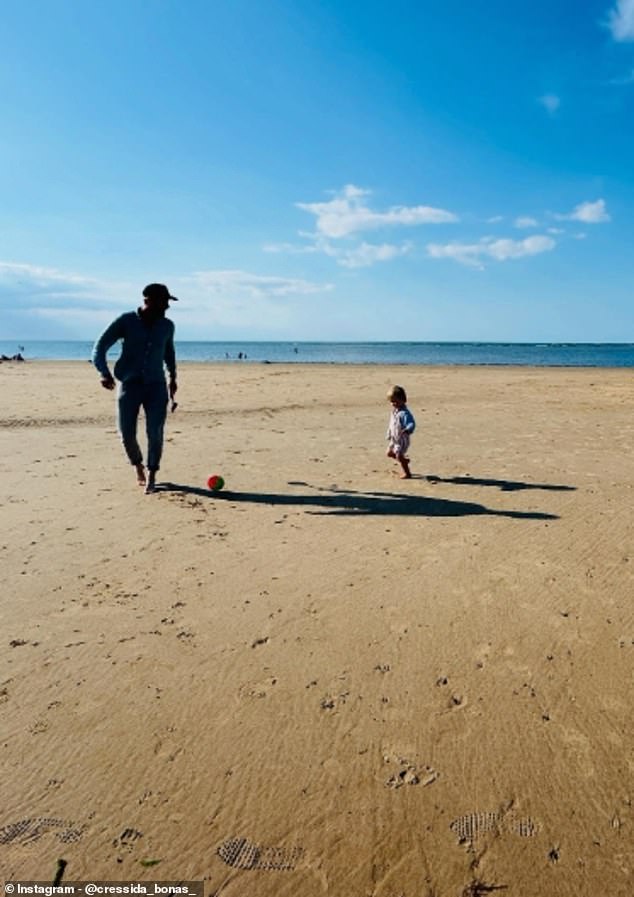 Cressida also shared a snap of her  husband, property developer Harry Wentworth-Stanley, playing football with their three-year-old, Wilbur