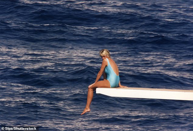 Diana sunbathing on the diving board off the coast of Italy