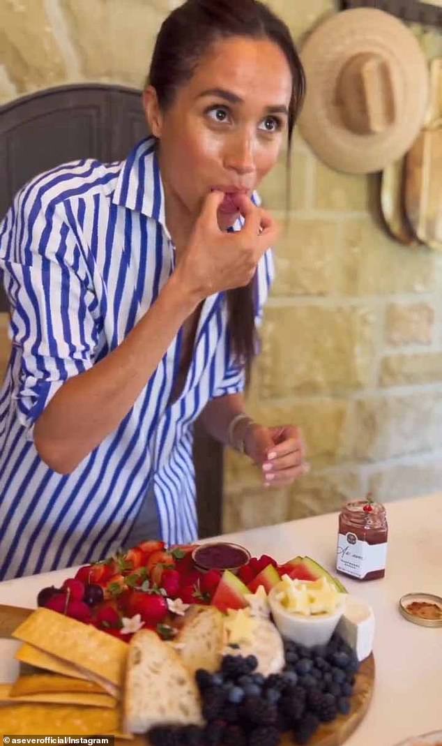 Meghan also posted a similar clip to her personal Instagram page just minutes later, @meghan, where she showed followers an aerial view of her assembling the festive platter