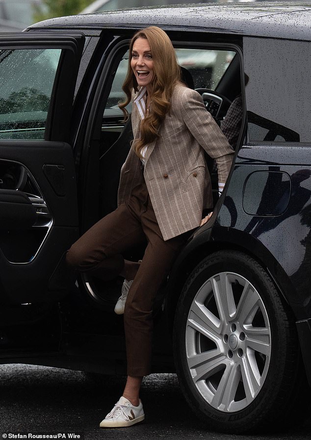Despite rainy weather, the royal mother-of-three looked practical and stylish upon her arrival at the hospital