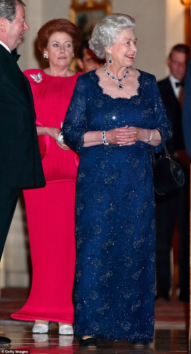 Lady Anson, pictured left in red behind the Queen, was not only Elizabeth's cousin, but one of her closest friends, having supported the monarch through the deaths of her mother, the Queen Mother, and sister, Princess Margaret
