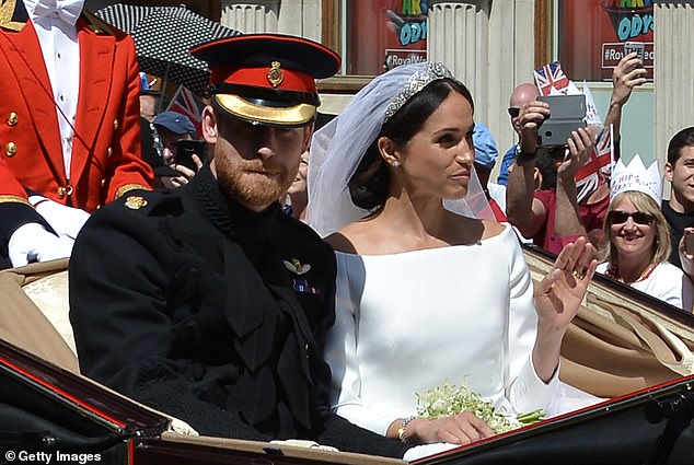 Prince Harry, Duke of Sussex and his wife Meghan, Duchess of Sussex, after their wedding  St George's Chapel, Windsor Castle, in Windsor, on May 19, 2018. A royal expert has written claims that they had upset the Queen