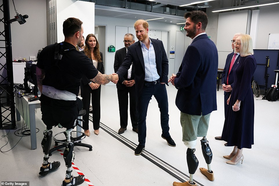 'We very much consider you part of our story,' Emily Mayhew, the paediatric blast injury lead at Imperial College London, told him when he arrived. The Prince himself spent 10 years in the British military, during which he served two tours in Afghanistan. He has made campaigning to help the fate of veterans one of his main priorities, founding the Invictus Games for military personnel wounded in action. He was joined by WHO chief Tedros Adhanom Ghebreyesus for a tour of the centre, where he met with research teams working on a number of world-leading projects. Showing him round was double leg amputee Dave Henson, an ambassador for the centre, who has known Harry for more than a decade and was the first captain of the British Invictus team in 2014. 'It's been hugely important for raising the profile of the centre,' Mr Henson, who lost his legs in an explosion in Afghanistan in 2011, said of Harry's involvement.