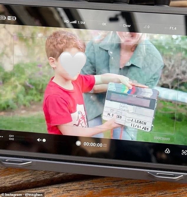 A third picture featured Archie in the shot as he held a clapperboard, which is used to mark scenes