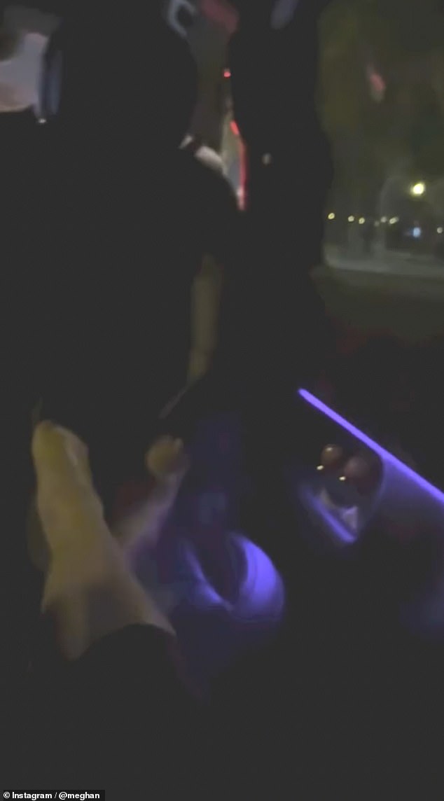 The short clip Meghan posted on Instagram showed her putting her feet up while being driven through the French capital