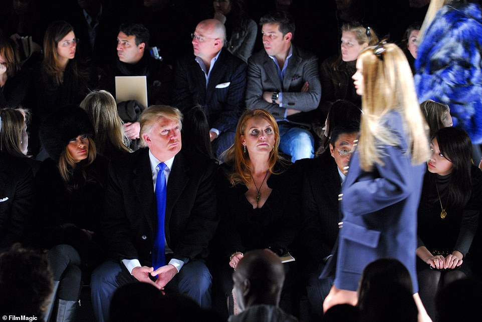 Continuing to revel in celebrity-esc public appearances - the Duchess of York was pictured in 2007 sat front row at the Mercedes-Benz show at New York Fashion Week, alongside Donald Trump and his wife Melania. Backstage, Fergie was tended to by an exclusive glam squad, while she also occupied a front row seat at the Dolce & Gabbana runway show in 2004 alongside American model and actress Amber Valletta. In a similar vein, just last week, Meghan made a public appearance at Paris Fashion Week, cutting an elegant figure in a stylish white oversized button-through ensemble at the Balenciaga show. Appearing amongst high-profile celebrity guests such as Rosie Huntington-Whiteley, FKA Twigs and Anne Hathaway, Meghan had her own catwalk moment as she channeled her inner supermodel in front of numerous cameras while exiting the star-studded show.