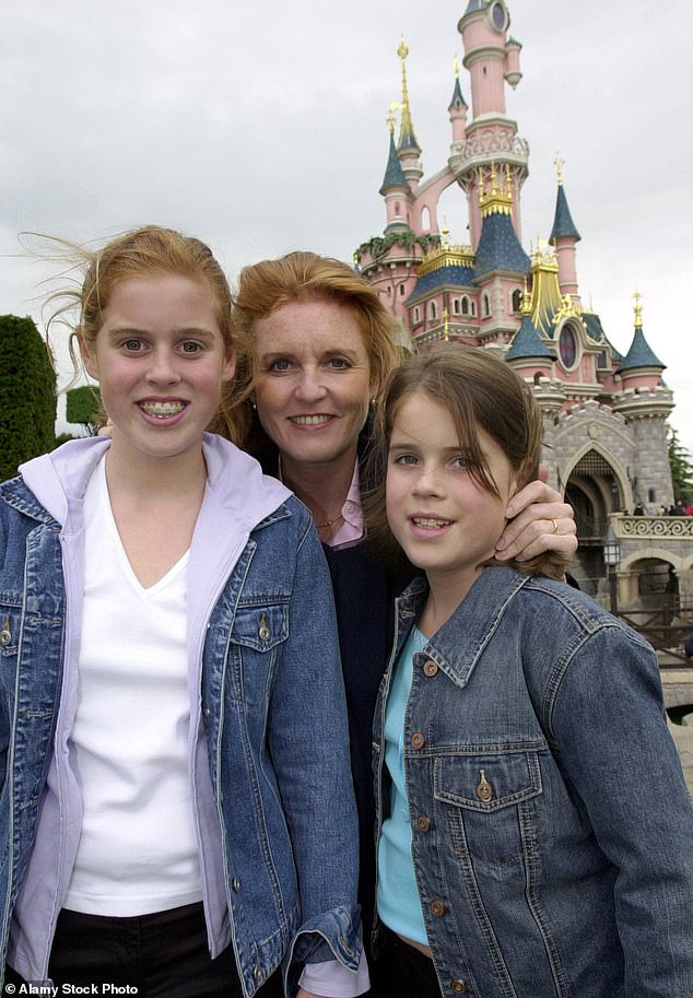 Similarities are even clear in the Duchesses holiday destinations -  The Duchess of York is pictured at Disneyland Paris in 2001 with her daughters, Princess Beatrice and Princess Eugenie, who was celebrating her 11th birthday