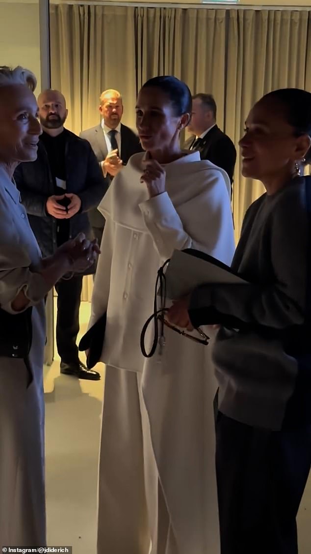 Meghan's interaction with Dame Kristin Scott Thomas appeared to be a slightly awkward one