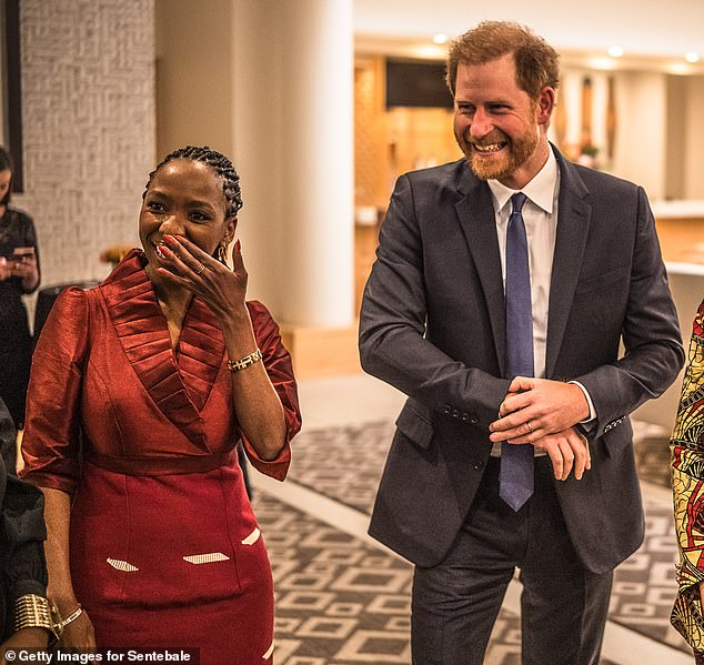 The Charity Commission criticised both sides for the 'damaging internal dispute'. Pictured: Dr Chandauka with Prince Harry last October