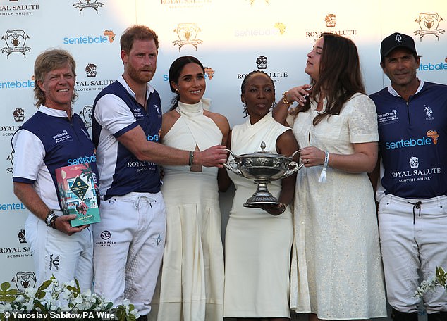 Dr Chandauka is pictured with the Sussexes at the Royal Salute Polo Challenge last April