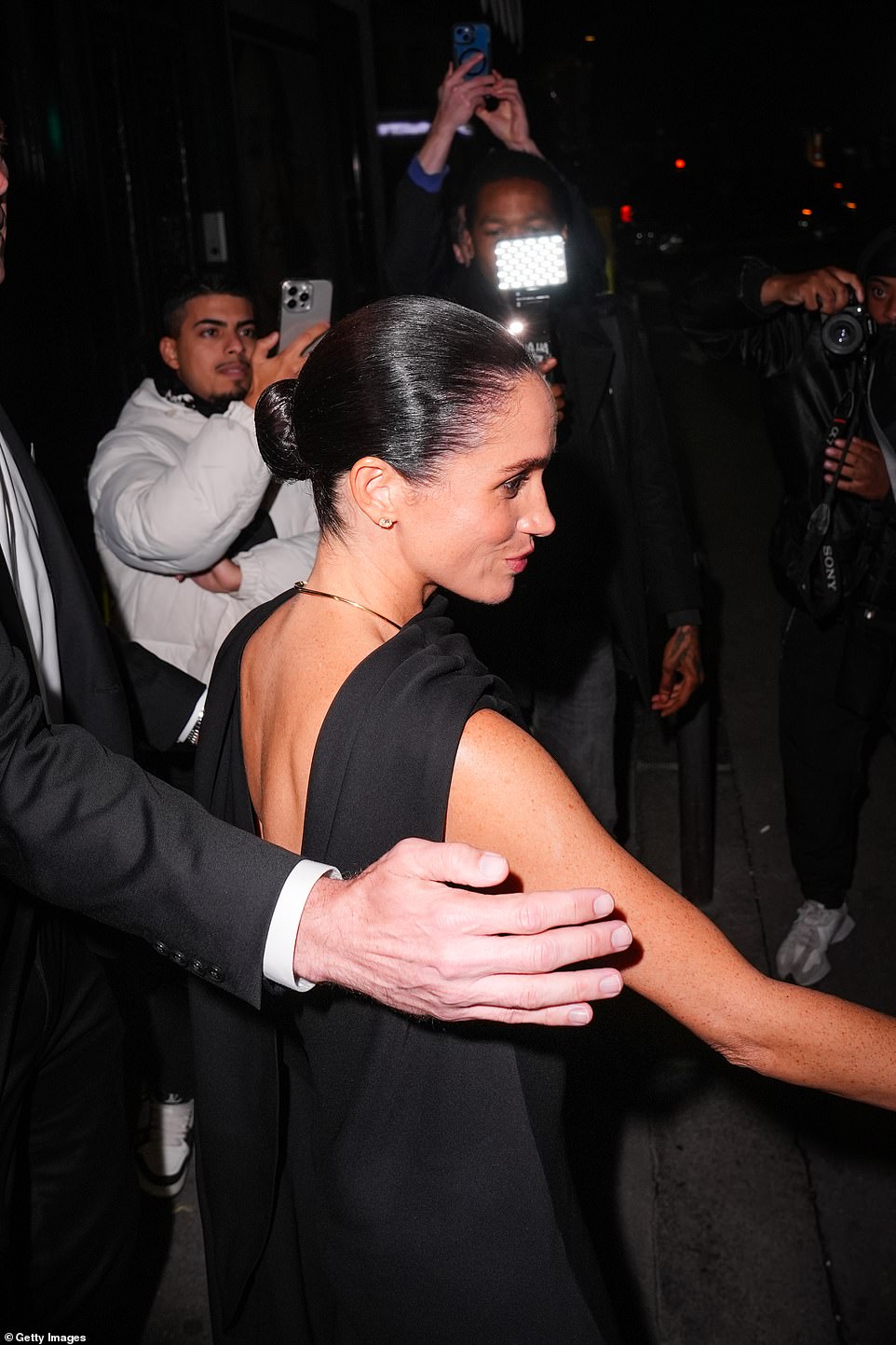 The mother-of-two paired the look with a black suede Balenciaga bag, glitzy oval diamond earrings and £745 black Balenciaga Knife heels. Appearing amongst high-profile celebrity guests such as Rosie Huntington-Whiteley, FKA Twigs and Anne Hathaway, Meghan had her own catwalk moment as she channelled her inner supermodel in front of numerous cameras while exiting the star-studded show. She was previously a regular at New York and Toronto Fashion Weeks whilst working as an actress on US drama series Suits.