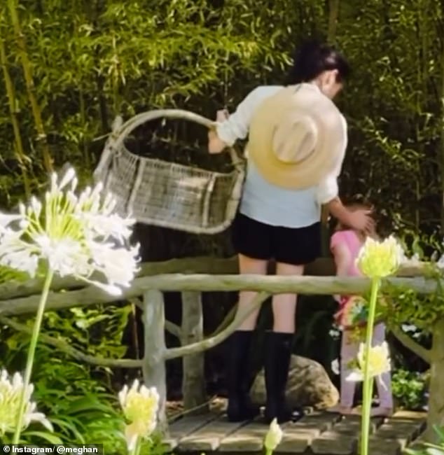 Lilibet was also seen with the colourful accessory in June when Meghan posted a picture of the pair foraging for fresh fruit on her Instagram page