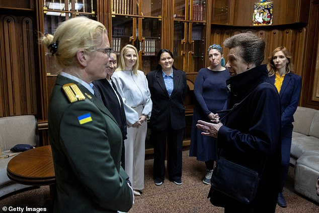 Princess Anne talks with Ukrainian service members and veterans at a World War Two museum in Kyiv