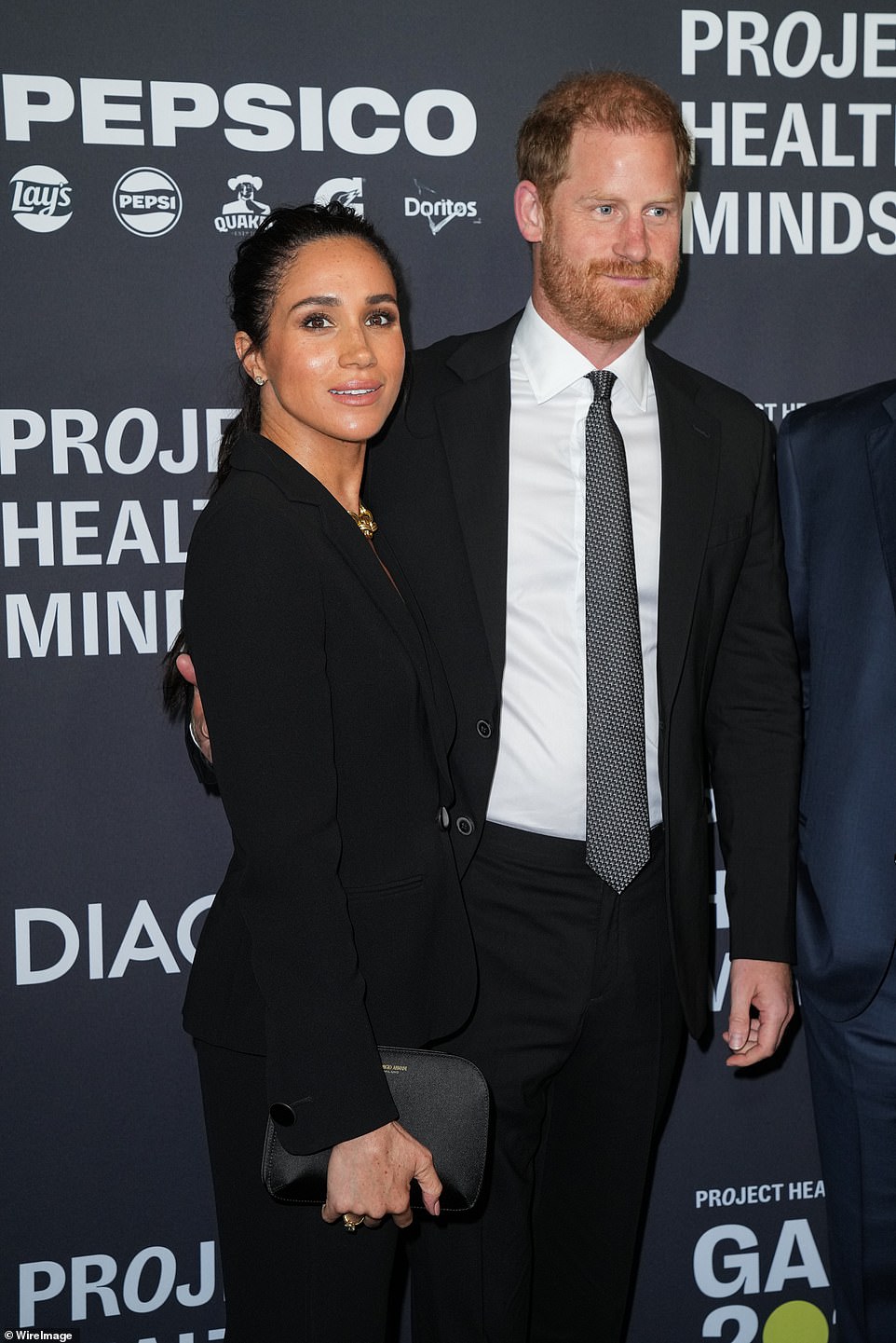 She said: 'Our children, Archie and Lili, are just six and four years old. Luckily still too young for social media, but we know that day is coming. 'Like so many parents, we think constantly about how to embrace technology's benefits, while safeguarding against its dangers.' While the Duke of Sussex, 41, was honored as 'a humanitarian, mental health advocate, environmentalist, and military combat veteran', Meghan was noted as a 'mother, wife, entrepreneur, and philanthropist'.