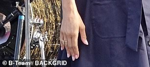 Meghan Markle was seen wearing a ring reported to be the 'Queen' ring from Logan Hollowell'