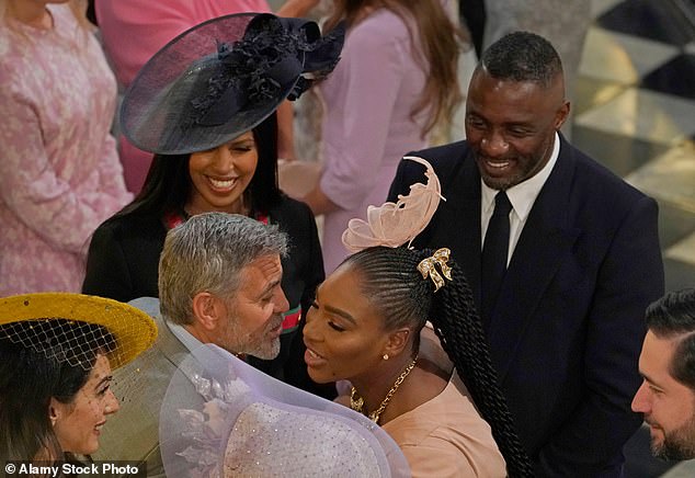 Pictured: George Clooney greets Serena Williams while actor Idris Elba and Sabrina Dhowre watch on at Meghan and Harry's wedding at St George's Chapel. Meghan has publicly insisted that she is 'not an influencer', but, rather, 'a female founder' and 'entrepreneur'