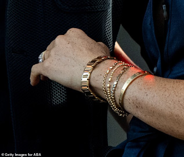 Meghan Markle, 44, dazzled as she and Prince Harry made a surprise joint appearance at Kevin Costner 's starry gathering in Santa Barbara on Saturday, opting for some of her favourite accessorries for the One805LIVE! concert which took place at the Yellowstone actor's oceanside estate