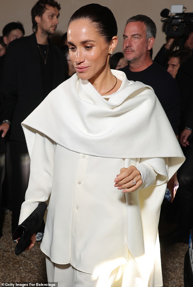 Speaking with New York Magazine's The Cut , Piccioli did say it was a 'beautiful surprise' and had helped keep her Paris visit to his show secret