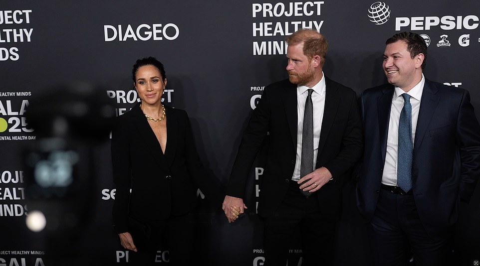 Meghan was left standing awkwardly, alone, waiting for him to arrive with some critics claiming she briefly 'glowered' before smiling. But a supporter said that she was going to every effort not to 'overshadow' her husband. Meghan then collected the humanitarian award and was praised as 'a mother, wife, entrepreneur, and philanthropist'. Harry's work with mental health companies and his controversial 2021 memoir Spare were listed among his achievements. CEO and founder of Project Healthy Minds, Phillip Schermer, told the audience the Sussexes', 'leadership and generosity...had made a profound difference in the lives of so many'.