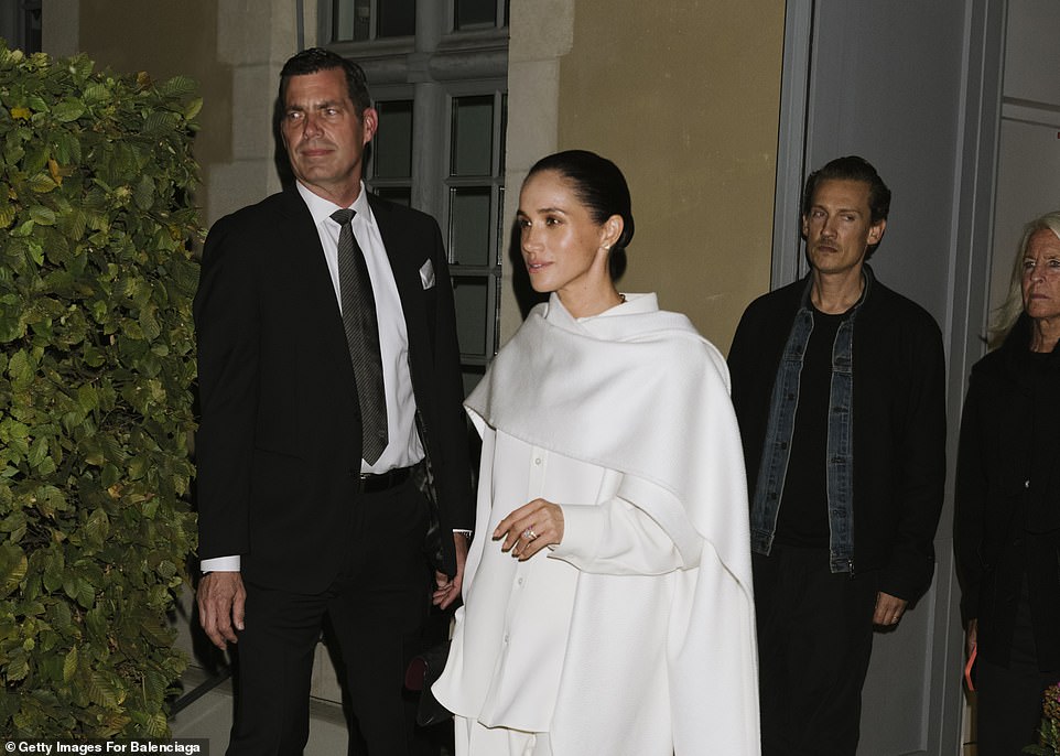 It has not been confirmed that a model fell over, and Meghan may have simply been sharing a moment of laughter with her friend. Nonetheless, royal fans were left baffled that she was the 'only one laughing' - seeming at odds with the rest of the audience, who watched the show in silence and with neutral expressions. A representative for Meghan said she wasn't laughing at the model. The Daily Mail has also reached out to Paris Fashion Week, Balenciaga for comment. Here is how her catwalk of catastrophe unfolded.