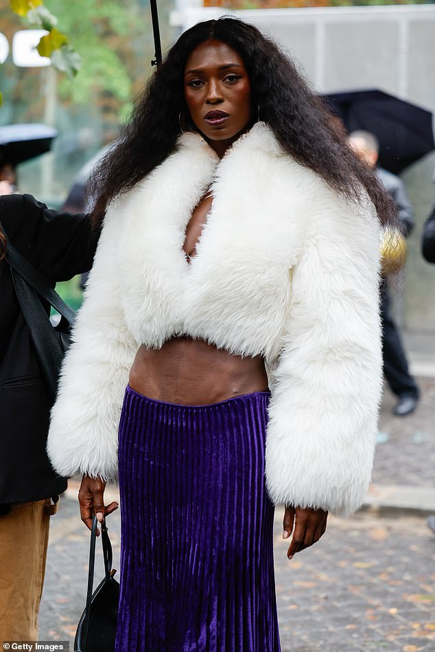 Jodie Turner-Smith is seen wearing a cropped pure white faux fur in Paris on Saturday