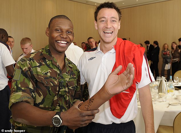 Mr McBean is pictured during a Lunch at the Grove Hotel where he met England football players including John Terry