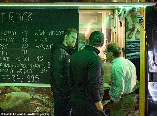 Prince Harry pictured at a food truck near the Ukrainian border, in Poland, on September 11