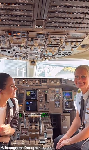 Meghan was seen chatting with pilots in the cockpit, before filming snippets of the view from her plane