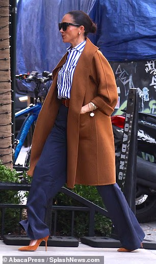 While in the Big Apple, Meghan was also seen heading to SoHo House to catch up with celebrity pals. She is pictured here on October 10 meeting Serena Williams for lunch