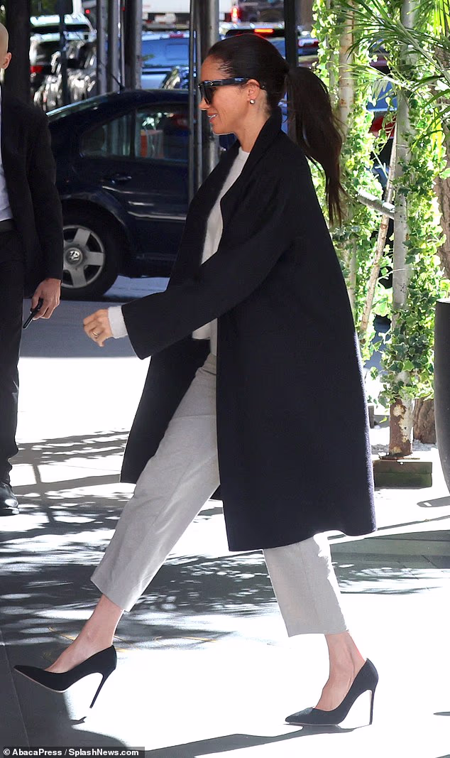 She donned some statement sunglasses and opted for a ponytail, keeping accessories to a minimum