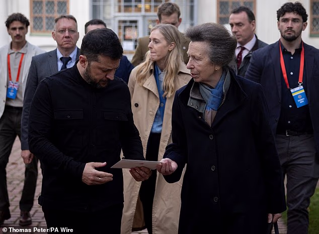 The Princess Royal hands a letter to President Volodymyr Zelensky during a meeting at St. Sophia's Cathedral in Kyiv, to discuss the UK's support for Ukraine
