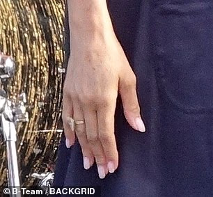 The teardrop-shaped accessory - sitting proudly on her ring finger - was complemented by some of her favourite bracelets for the One805LIVE! concert which took place at the Yellowstone actor's oceanside estate