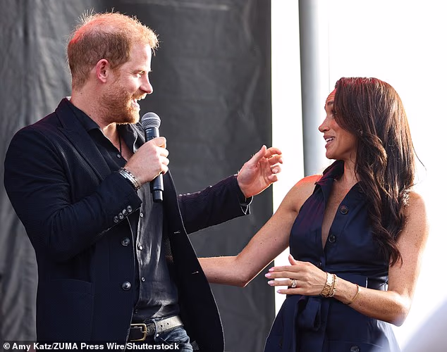 Harry and Meghan addressed the crowds at the starry charity event in Santa Barbara on Saturday (pictured)