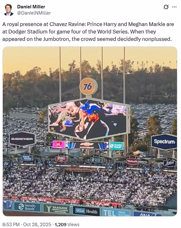 A reporter said that fans were 'nonplussed' when the royal couple came up on the big screen