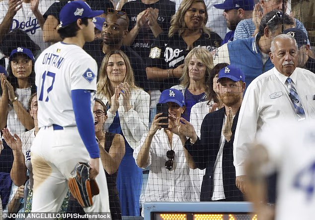 At one point, Meghan pulled out her phone to capture some footage of Shohei Ohtani