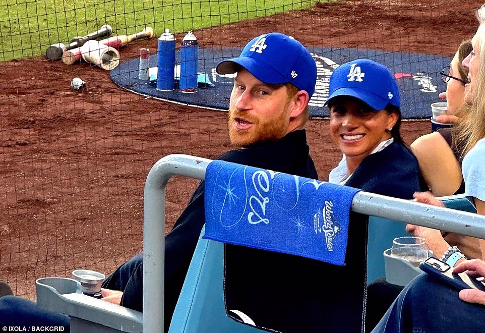 Markle lived in Toronto while filming the TV show that made her famous - Suits - spending seven years there and regularly talking up her relationship with the city. 'It is like my home,' she told Best Health magazine in 2015. 'At the onset, I didn¿t know what to expect, but everyone has been so welcoming. The people are so kind, I love the food scene, and I really love exploring little nooks around the city with my two dogs¿ I love how much green space there is tucked away ¿ you wouldn¿t expect that.' She has even been spotted in Blue Jays colors on multiple occasions, with one fan photo in a cap being widely shared on social media. Harry, meanwhile, also has a deep connection with Canada which has left fans claiming he should be supporting the Blue Jays over the Dodgers.